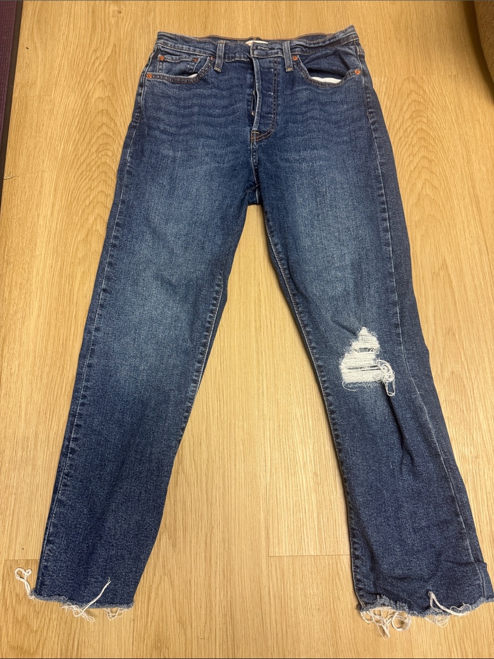 Levi's Dark Blue Distressed Ankle Jeans